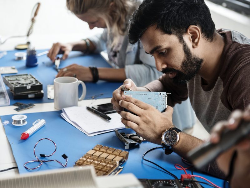 electrical-technicians-working-electronics-parts-2048x1528-1.jpg